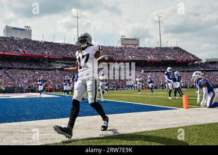 Las Vegas Raiders' Davante Adams (17) celebrates after scoring a touchdown  during the first half of an NFL football game against the Buffalo Bills,  Sunday, Sept. 17, 2023, in Orchard Park, N.Y. (