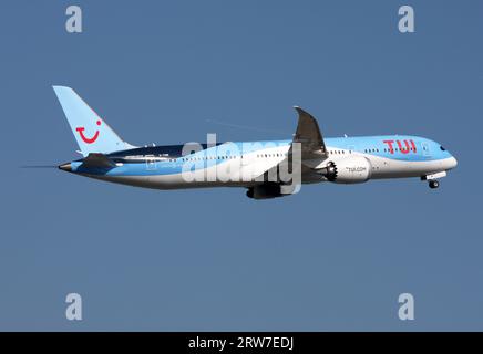 A Boeing 787-9 Dreamliner of TUI departs London Gatwick Airport Stock Photo