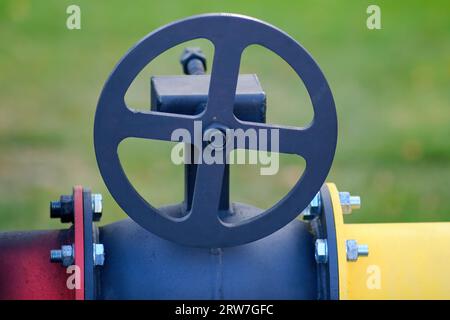 Fire extinguishing module with heat flow on gas pipes. Close-up of a valve on a gas pipeline. Selective focus. Stock Photo