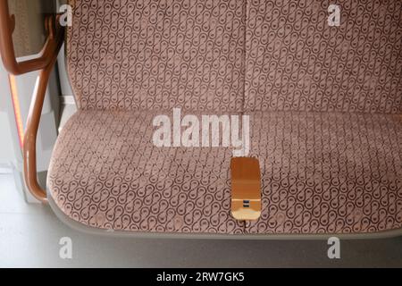 Train seat in the cabin of a passenger with usb port Stock Photo