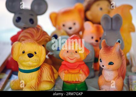Plastic ussr toys for sale at a flea market, close up Stock Photo
