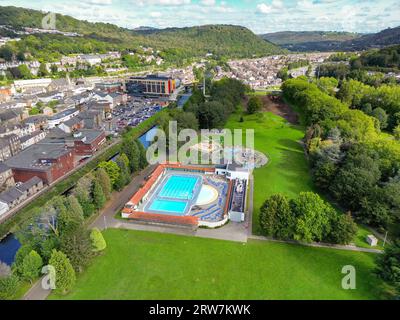 Pontypridd, Wales - 12 September 2023: Drone view of the open air lido swimming pool in the town's Ynysangharad park. Stock Photo