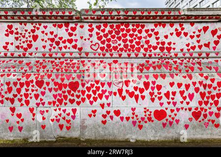 London, UK - May 17, 2023:  National Covid Memorial Wall showing hearts that represent the people died from Covid-19, a visual representation of the U Stock Photo