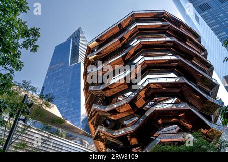 New York, NY - US - Sept 7, 2023 Wide angle view of Thomas Heatherwick’s designed Vessel, a spiral staircase and new landmark of Hudson Yards and the Stock Photo