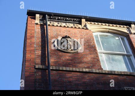 Terracotta brickwork, on old building Fireclay works Sheffield city centre England UK victorian architecture Stock Photo