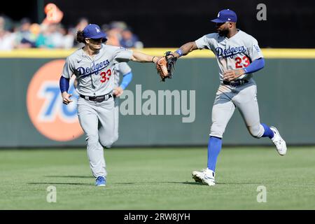 James Outman is congratulated by Mookie Betts of the Los Angeles