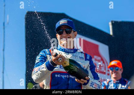 Monterey, CA, USA. 10th Sep, 2023. INDYCAR Series driver, ALEX PALOU (10) of Barcelona, Spain, wins the Astor Trophy and the championship at WeatherTech Raceway Laguna Seca in Monterey, CA. (Credit Image: © Riley S Bridges Grindstone Media/ASP) EDITORIAL USAGE ONLY! Not for Commercial USAGE! Stock Photo