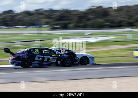 Melbourne, Australia, 17 September, 2023. Mason Kelly (22) driving Nissan Altima for Kelly Racing - Super3 trying to overtake during Dunlop Series at the Penrite Oil Sandown 500 at the Sandown International Raceway on September 17, 2023 in Melbourne, Australia. Credit: Santanu Banik/Speed Media/Alamy Live News Stock Photo