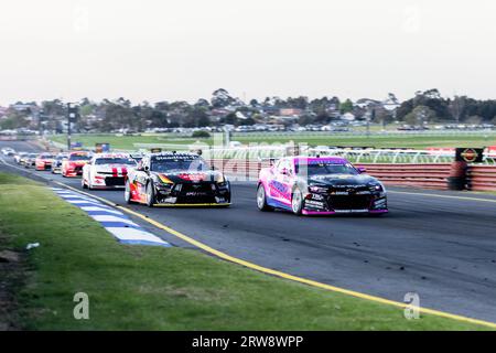 Melbourne, Australia, 17 September, 2023. Intense wheel to wheel race during Repco Supercars Championship at the Penrite Oil Sandown 500 at the Sandown International Raceway on September 17, 2023 in Melbourne, Australia. Credit: Santanu Banik/Speed Media/Alamy Live News Stock Photo