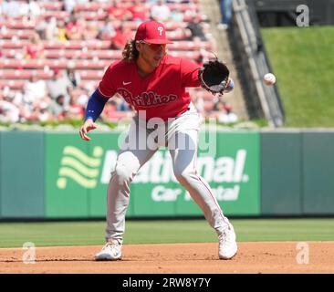 Philadelphia Phillies third baseman Alec Bohm (28) reacts after being hit  by a pitch from New York Yankees relief pitcher Jonathan Loaisiga in the  seventh inning of a baseball game, Wednesday, April