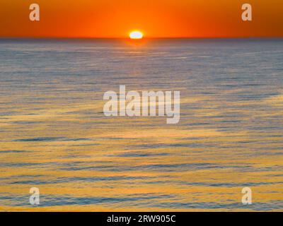 Sunrise seascape with clear skies at Shelly Beach on the Central Coast, NSW, Australia. Stock Photo