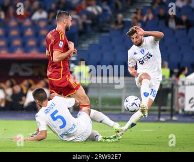 Rome. 17th Sep, 2023. Empoli's Alberto Grassi (front) scores the own goal during a Serie A football match between Roma and Empoli in Rome, Italy, on Sept.17, 2023. Credit: Alberto Lingria/Xinhua/Alamy Live News Stock Photo