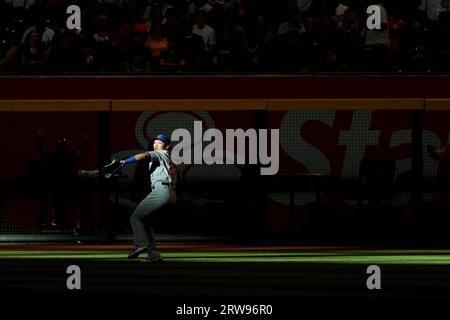 Seiya Suzuki of the Chicago Cubs makes a thumbs-up gesture on base after  hitting a double during the fourth inning of a baseball game against the  Los Angeles Angels at Angel Stadium