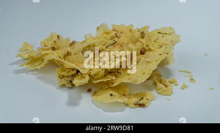 Kacang rempeyek or peyek. crackers made from peanuts mixed with rice flour mixture, which are fried. Isolated on white background Stock Photo