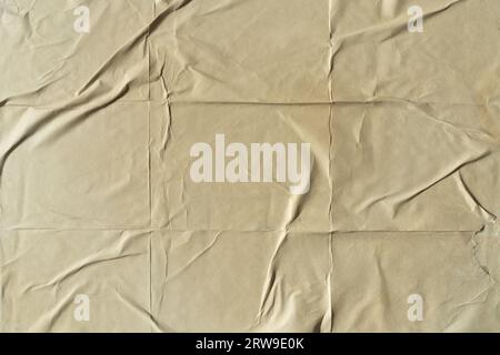 Old folded yellow cream paper texture background Stock Photo
