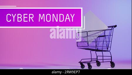 Image of cyber monday text over shopping trolley Stock Photo