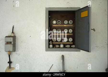 Old fuse box with fuses Stock Photo