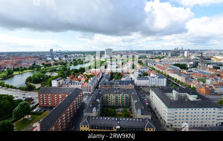 Views of residential neighborhoods in Freetown Christiania from the Church of Our Saviour in Copenhagen, Denmark. Stock Photo