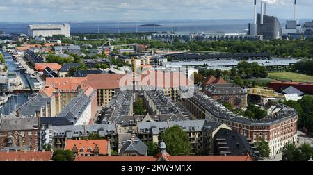Views of residential neighborhoods in Freetown Christiania from the Church of Our Saviour in Copenhagen, Denmark. Stock Photo