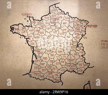 A map carved in the wall inside the Mémorial des Martyrs de la Déportation (Memorial to the Martyrs of the Deportation) in Paris showing how many Fren Stock Photo