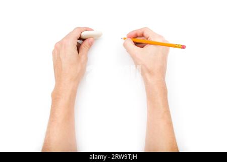 Human hands with pencil and eraser isolated on white background with shadows Stock Photo