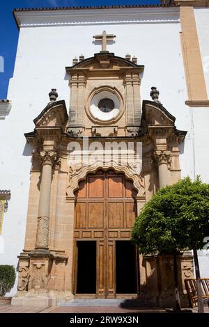 Baroque style redstone doorway of the Church of Incarnation (Spanish: Iglesia Mayor de Santa Maria de la Encarnacion) in Marbella, southern Stock Photo