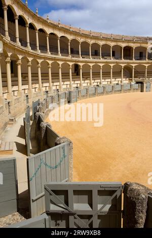 Open gate to bullring in Ronda, opened in 1785, one of the oldest and most famous bullfighting arena in Spain Stock Photo