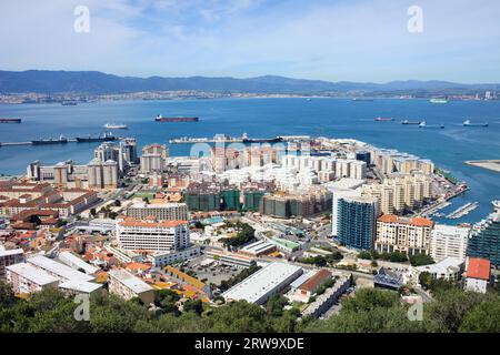 Gibraltar town urban scenery and Gibraltar Bay on southern part of Iberian Peninsula, Spain on the horizon Stock Photo