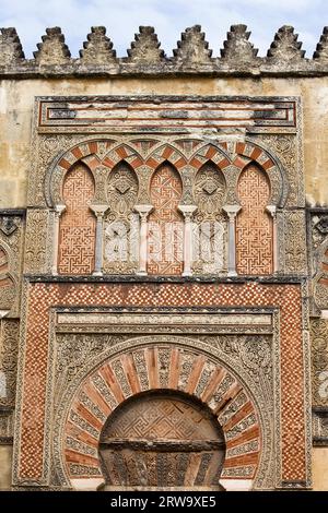 St. Stephen's Gate (Spanish: Puerta de San Esteban) Islamic design details on Mezquita (Cathedral of St. Mary of the Assumption) facade in Cordoba Stock Photo