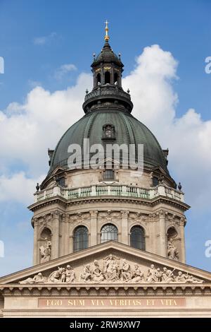 Dome and decorated with sculptures tympanum of the St. Stephen's Basilica in Budapest, Hungary Stock Photo