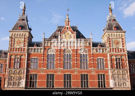 Amsterdam Central Train Station facade in Holland, Netherlands, 19th century Neo-Renaissance and Neo-Gothic style Stock Photo