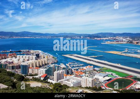 Gibraltar city and bay, apartment buildings, condominiums, Gibraltar airport runway, view from above Stock Photo