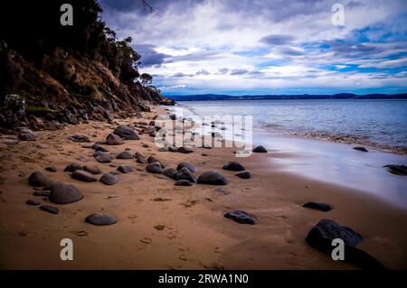 Beautiful pebble sand beach near Hobart, Tasmania, Australia Stock Photo