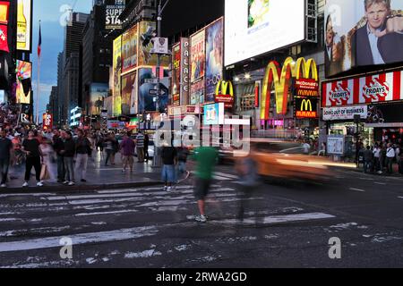 NEW YORK CITY, USA, JUNE 8: Long exposure of people at Times Square. June 8, 2012 in New York City, USA Stock Photo