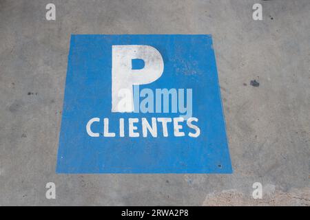 Close-up of a sign painted on a parking space reserved for customers of a commercial premises Stock Photo