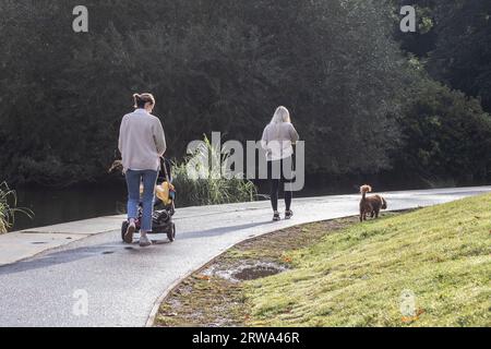 UK, Weather, Northampton,18th September 2023. Over night rain clearing for dog walkers exercising their pets early morning in Abington Park  with  patches of sunshine showing occasionally with more rain forecast for later today. Credit: Keith J Smith/Alamy Live News Stock Photo