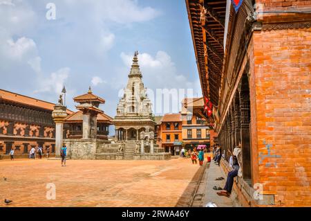 Bhaktapur, Nepal, circa June 2012: Photo of high old monument in centre of square in Bhaktapur, Nepal. Documentary editorial Stock Photo