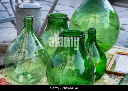 https://l450v.alamy.com/450v/2rwa4ga/set-of-antique-jar-and-demijohns-on-street-flea-market-2rwa4ga.jpg