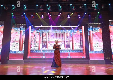 Luannan County, China - August 15, 2019: Female singing on stage, Luannan County, Hebei Province, China Stock Photo