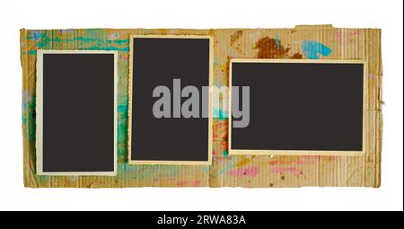 old empty photo frames, vintage photo prints, flat lay on grungy cardboard, free pics space,isolated on white  backaground Stock Photo