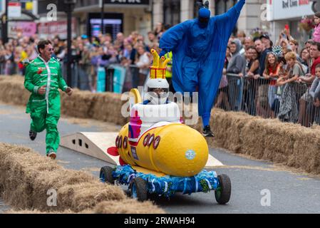 Colchester Soapbox Rally. Soapbox derby gravity racing in the High Street of Colchester, Essex, UK. Entry 33, Flower Power Stock Photo