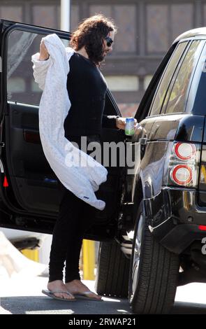 Los Angeles, USA 18th September 2023 FILE IMAGE dated 5 June 2012 Russell Brand arrives at a yoga class with a mystery brunette. Russell has been seen regularly arriving and leaving with the girl before the pair head to Russell's West Hollywood home. Credit: Headlinephoto/Alamy Live News Stock Photo