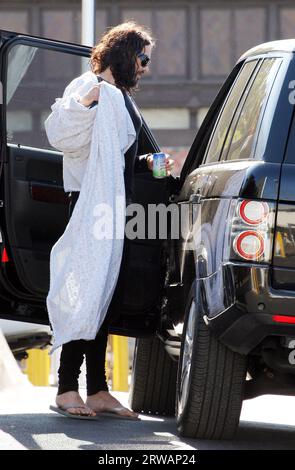 Los Angeles, USA 18th September 2023 FILE IMAGE dated 5 June 2012 Russell Brand arrives at a yoga class with a mystery brunette. Russell has been seen regularly arriving and leaving with the girl before the pair head to Russell's West Hollywood home. Credit: Headlinephoto/Alamy Live News Stock Photo