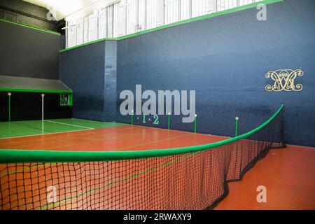 Interior / inside the Royal Tennis Court, Hampton Court Palace, a Grade I listed court for playing the sport of real tennis. (135) Stock Photo