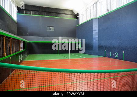 Interior / inside the Royal Tennis Court, Hampton Court Palace, a Grade I listed court for playing the sport of real tennis. (135) Stock Photo