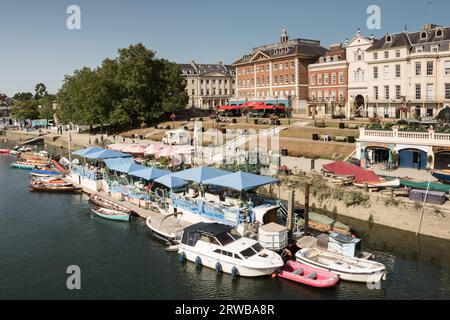 Peggy Jean Barge and exclusive riverside property on the River Thames at Richmond Upon Thames, London, England, U.K. Stock Photo