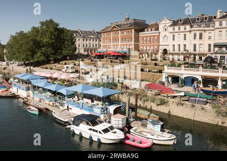 Peggy Jean Barge and exclusive riverside property on the River Thames at Richmond Upon Thames, London, England, U.K. Stock Photo