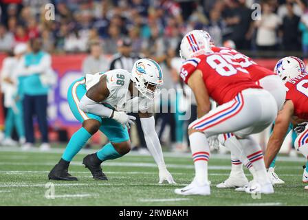 Miami Dolphins defensive tackle Anthony Moten (43) attempts to