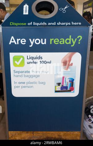 Bin for waste liquid, liquids, sharp items and sharps, displaying rules ...