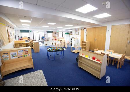 Nursery classroom scene for primary aged school children full of children's activities. Stock Photo